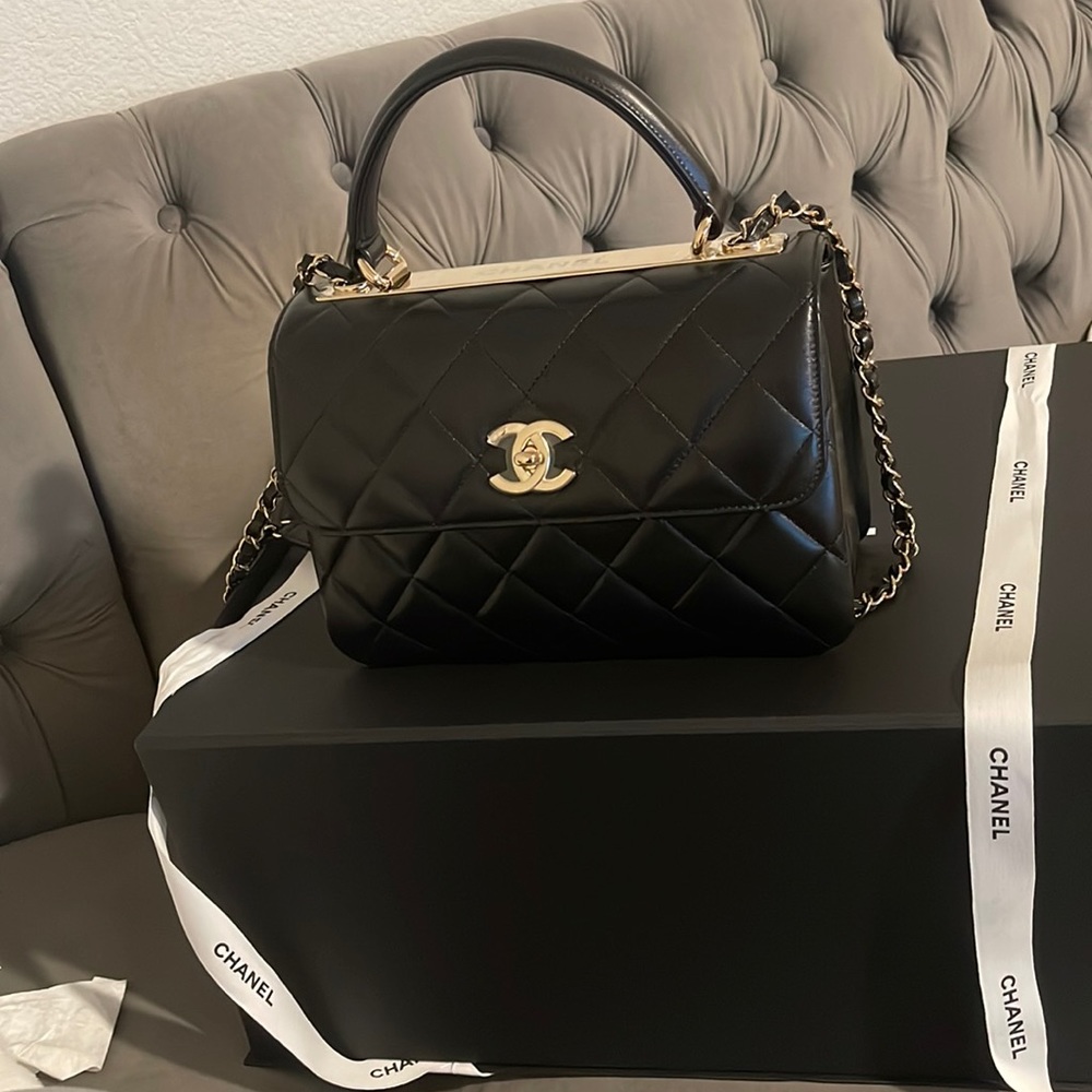 FLAP BAG WITH TOP HANDLE